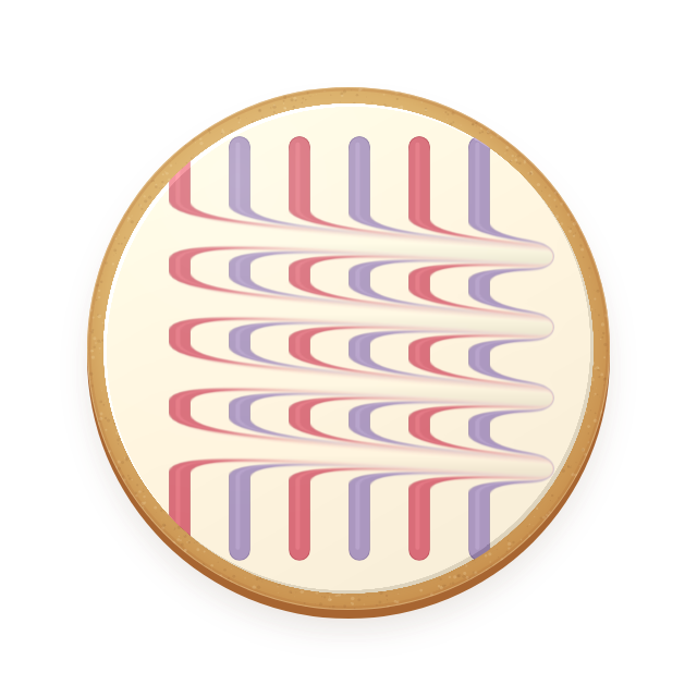 A vanilla cookie with pink and lavender feathered icing